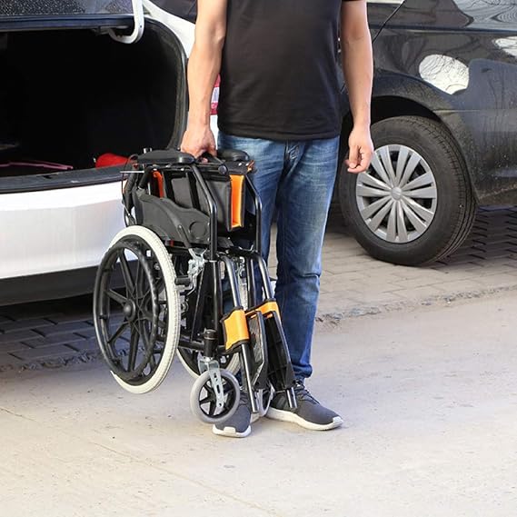 Silla de Ruedas Premium – Ultra Liviana 11 kg - Plegable, Ruedas Robustas, Apoyabrazos y Reposapies Abatibles